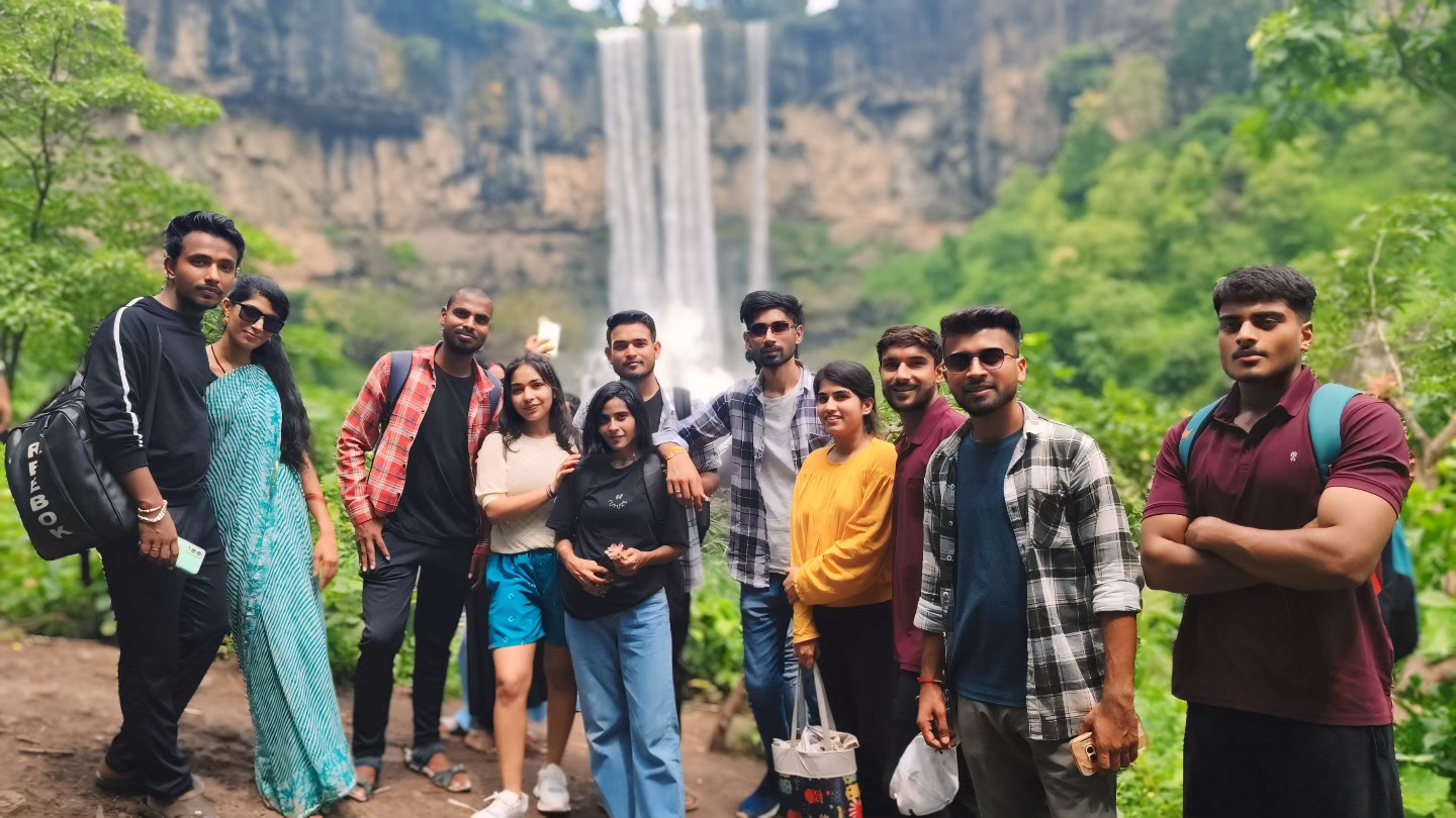 FUN TOUR group together at a waterfall in Mohadi